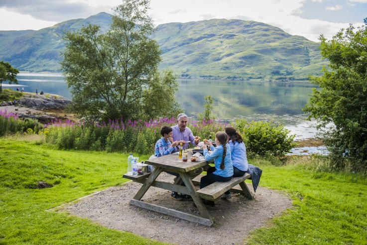 Family enjoying a picnic near Loch Linne