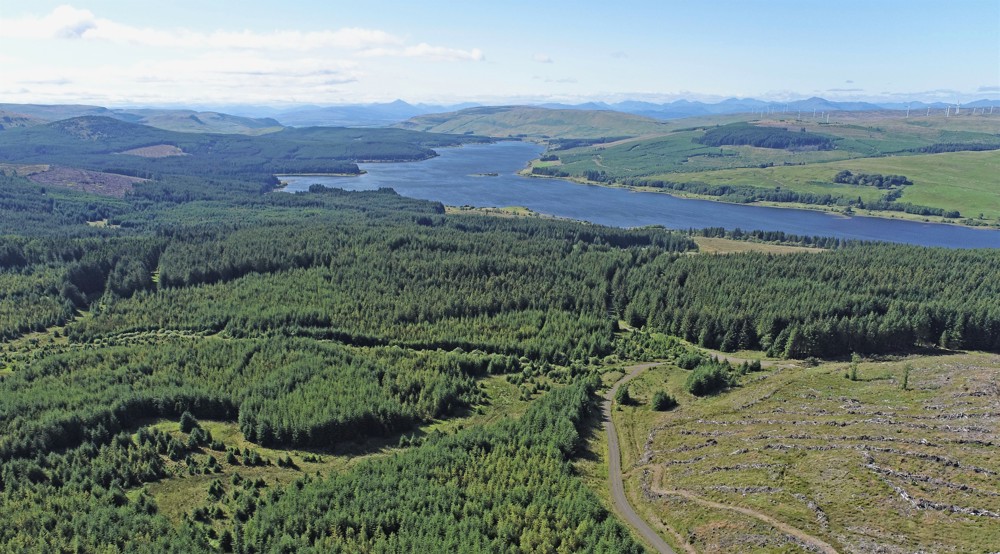 View looking over the forests in Carron Valley, with Carron Valley Resevoir at the centre